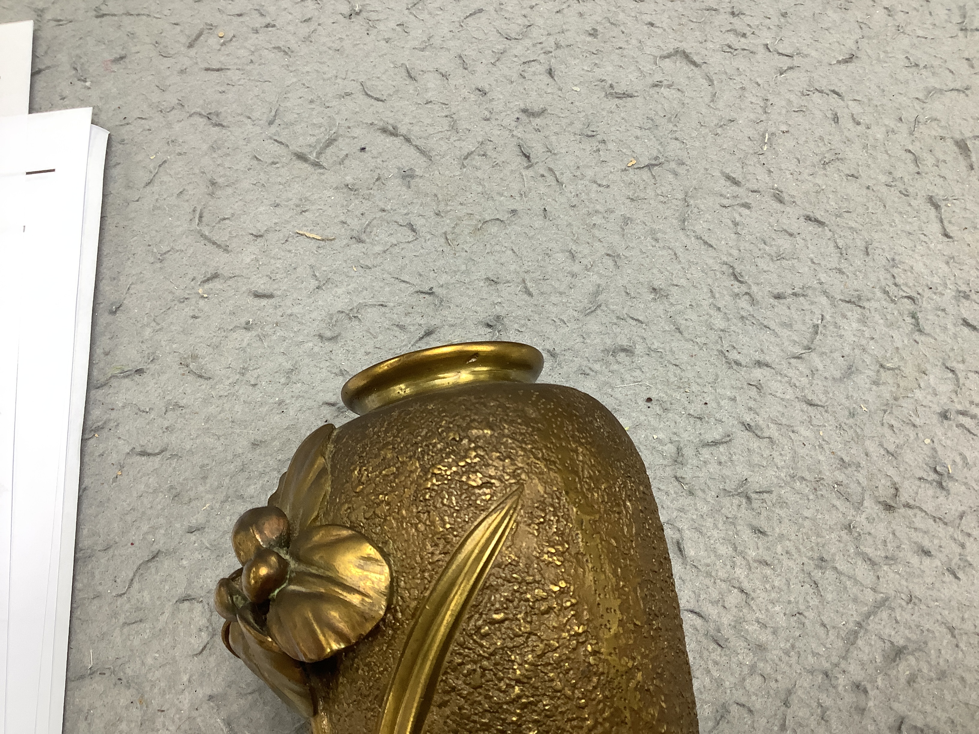 A Japanese bronze vase, with applied lily decoration, 17cm high